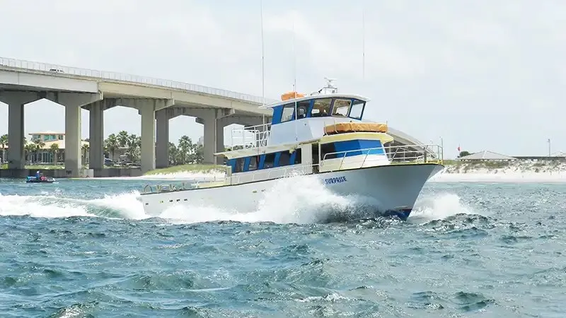 A charter boat operated by Reel Surprise Charters at the dock