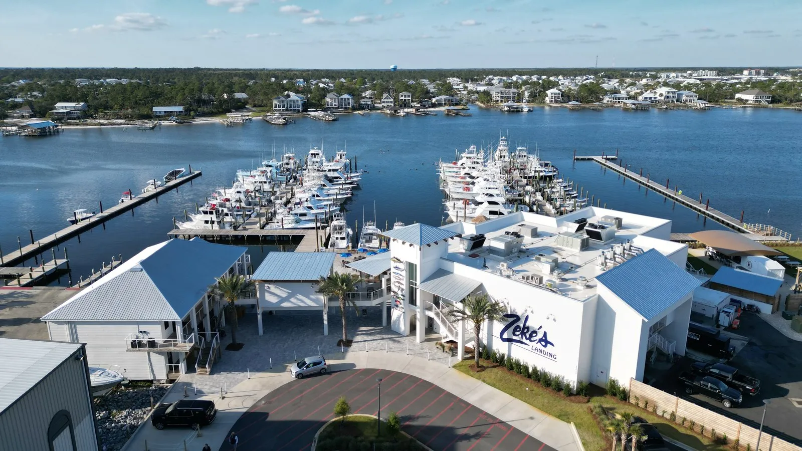 An aerial view of Zeke’s Landing Marina, its docks and moored boats